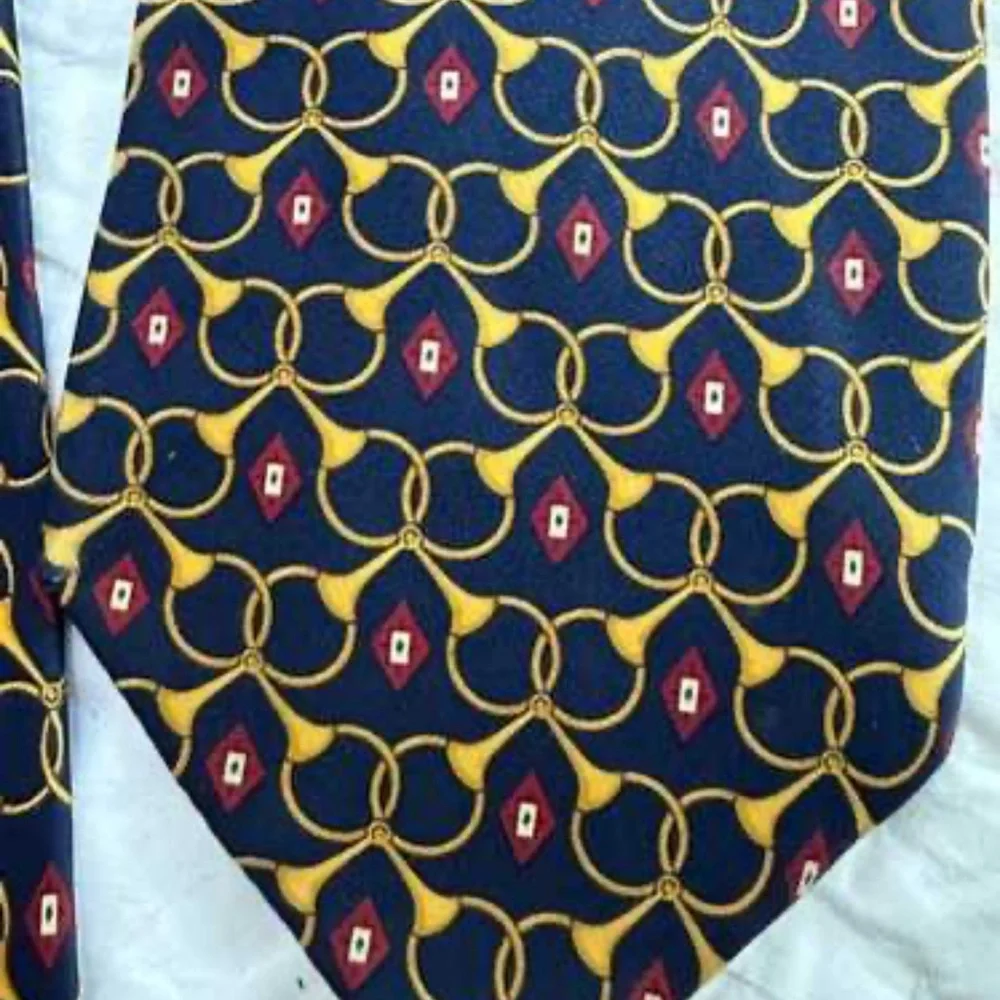 Paulo Gucci Stylish Gold Tie featuring horse stirrups and horns.